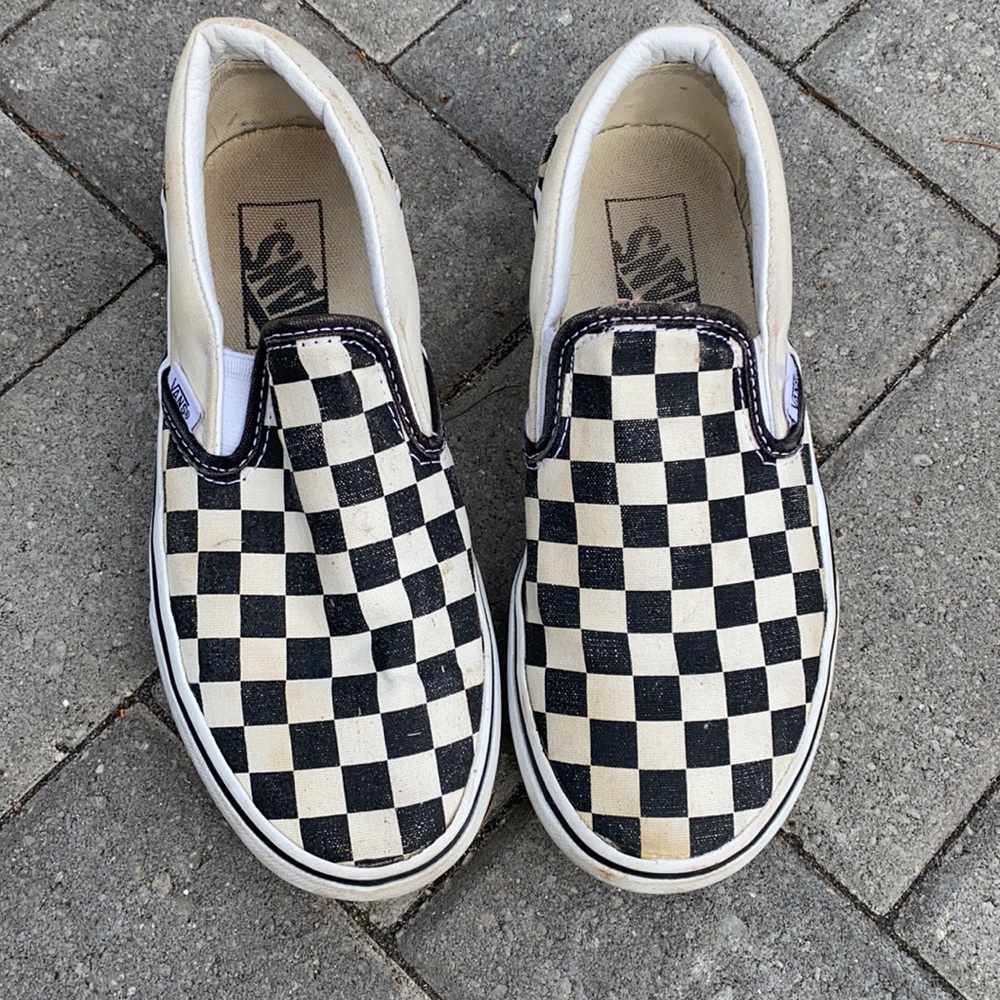 Thick soled Vans black and white checked slip on shoes